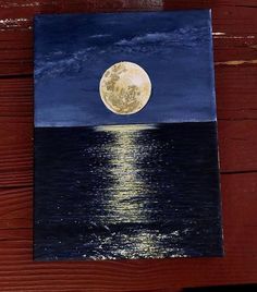 a painting of a full moon over the ocean with water reflecting it's surface