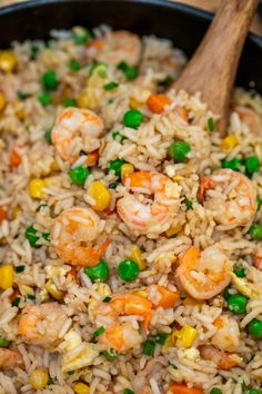 rice with shrimp and peas in a skillet