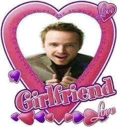 a man making a funny face in front of a heart with the words girlfriend love