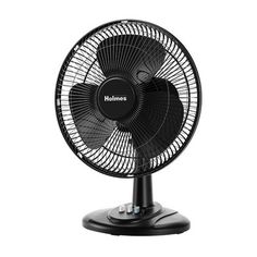 a black fan sitting on top of a table