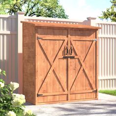 an outdoor storage shed with two doors and one door open to reveal the outside space