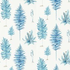 a blue and white wallpaper with different types of plants on it's sides