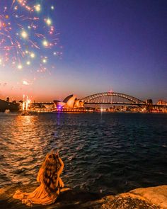 girl sitting at Mrs Macquaries Chair watching fireworks with Sydney Opera House and Harbour Bridge in background Sydney Fireworks, Olympic Pool, Street Library, Things To Do In Sydney, Victoria Building, North Sydney