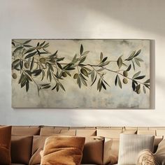 a painting hanging on the wall above a couch