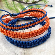 "Matching bracelet for family, made of waxed cord. These waterproof adjustable bracelets are the perfect combination to wear on Season Football Game. These Football Team bracelets were designed for everyday wear. These minimalist boho Navy Blue and Orange cord bracelets enhance your casual outfit.  ♥ ITEM DETAILS: Total length: The size of the bracelet is adjustable.  💕The bracelet has an adjustable closure that will work on a wrist of about 6 - 7\"💕 Materials: Waxed cord. Waxed Cord Available: Navy Blue - Orange - Two Colors: Orange/Navy Blue Waxed Cord Size: 1mm waxed cord ♥ GIFT IT Jewelry comes in a cute canvas bag ready to gift! If you wish your item to be a gift, please let me know and I will include a cute little card with a personal message. ♥ CURRENT PROCESSING TIMES: we usually Couples Football, Bracelet For Couples, Football Team Gifts, Team Bracelets, Football Bracelet, Wax Cord Bracelet, Bracelet Matching, Surfer Bracelets, Cute Canvas