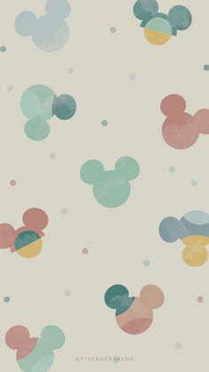 mickey mouse wallpaper with different colors and shapes on it's surface, including dots