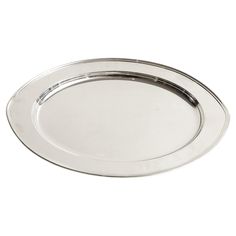 an empty silver plate on a white background