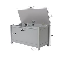 an image of a white box with two faucets in it and measurements for the bottom