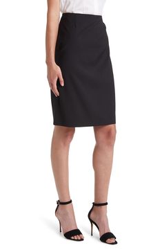 Bring modern style to your work-to-weekend wardrobe with this pencil skirt crafted from pure virgin wool. 23" center front length (size 8)   Lined   100% virgin wool   Dry clean   Imported   Hugo Boss/BOSS/HUGO has received the Fair Labor Association accreditation, which signifies that the company has effective systems and procedures in place to successfully uphold fair labor standards throughout its supply chains, including strategies and tools to address and improve working conditions Elegant Wool Skirt For Office, Classic Wool Pencil Skirt For Work, Office Wool Skirt With Lining, Office Wool Lined Skirt, Office Wool Skirt In Black, Chic Fitted Wool Pencil Skirt, Wool Knee-length Workwear Skirt, Fitted Wool Skirt For Work, Wool Lined Skirt For Workwear