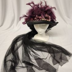 Vintage Original Elsie Massey Victorian Walk In The Park Hat Black Walk In The Park Hat With A Eggplant Pleated Top, Black Ruffled Lace On The Brim, Plum Flowers & Plum Feathers. It Is Finished Off With A Black English Netting Bow And Train On The Back. 2.5" Brim, 6" Tall, 22" Interior Em1323 Purple Brimmed Mini Hat For Evening, Plum Flowers, Eggplant Color, Pleated Top, Pleat Top, Walk In The Park, Black Ruffle, Eggplant, The Park