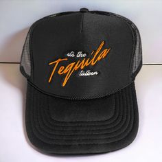 Make a 'spirited' statement with this Tequila Talkin' Trucker Hat. Perfect for your night out shenanigans and sippin' on drinks - don't worry about what you said last night, just blame it on tequila! This hat has your back (and your head!) while you party. Salud! All of our products are handmade to order and ship within 10 business days. Thank you for shopping small! Tequila Trucker Hat, Hat Sayings, Stagecoach Outfit, Texas Hat, Rhinestone Outfit, Festival Fits, Trucker Hat Black, Nude Outfits