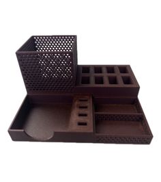 a brown tray with compartments for various items