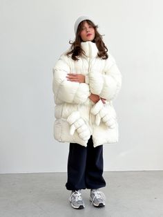 "Step into cold weather with an oversized winter jacket. Long sleeves and water repellent fabric finish - which encourages water to bead off its surface.  Plush poly fill adds extra warmth - 100% Recycled Polyester. Suitable for temperatures up to -20С / -4.0℉ More jackets here: https://www.etsy.com/shop/ArtVyshyvankaUA?ref=seller-platform-mcnav§ion_id=39368873 🔷Model is 168cm/5'5\" and wearing size S ----------------------------------------------------------------------------------------------------- 🔷DETAILS: -front zip closure -long sleeves -water repellant ----------------------------------------------------------------------------------------------------- 🔷CARE: machine washable 30-40C (95-105F)  -------------------------------------------------------------------------------------- Winter White Nylon Puffer Outerwear, Oversized Duck Down Puffer Jacket, Winter White Duck Down Puffer Outerwear, Winter Oversized Duck Down Outerwear, Winter White Puffer Outerwear For Cold Weather, Winter White Down Puffer Jacket, Oversized Winter White Puffer Jacket For Winter, Winter White Puffer For Cold Weather, White Duck Down Outerwear For Fall