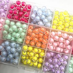 there are many different colors of beads in the box