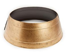 a gold colored metal bowl on a white background with clippings to the bottom