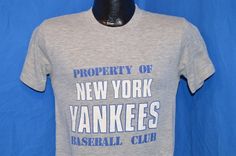 a t - shirt that says property of new york yankees baseball club