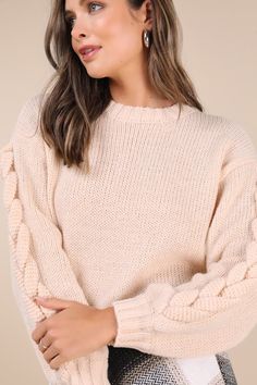 Ensure that the fall season is full of compliments and admirers with the Lulus Playful Comfort Cream Cable Knit Crew Neck Pullover Sweater! This soft and stretchy sweater has a classic crew neck and long sleeves with drop shoulders, fitted cuffs, and cable knit accents. The relaxed-fit bodice finishes at a slightly cropped hem. Contrasting ribbed knit trims the neckline, cuffs, and hem to complete the look. Fit: This garment fits true to size. Length: Size medium measures 20" from shoulder to hem. Bust: Great for any cup size. Waist: Loosely Fitted. Undergarments: May be worn with any standard bra. Fabric: Fabric is very stretchy. Unlined. 100% Polyester. Hand Wash Cold. Do Not Bleach. Dry Flat. Iron Low Heat. Imported. Lulus | Playful Comfort Cream Cable Knit Crew Neck Pullover Sweater | Casual Formal Dresses, Lulu Fashion, Casual Wedding Dress, Cable Knit Sweater, Flat Iron, Cup Size, White Sweaters, Fitted Bodice, Cropped Sweater