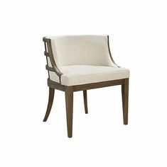 an upholstered chair with white fabric and wood trimmings on the back