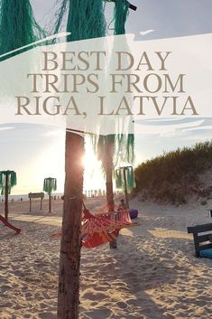 there is a sign that says best day trips from riga, lativa on the beach