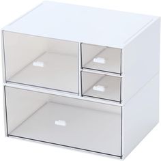 the three drawers are white and have clear glass doors on each drawer, which is open