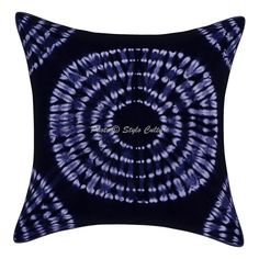 a black and blue tie dye pillow with the words,'love is in the air '