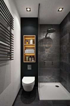 a bathroom with a toilet, sink and shower stall in the middle of the room