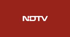 the ndtv logo is shown on a red background, with white letters below it