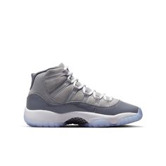 The Air Jordan 11 Retro GS ‘Cool Grey’ 2021 is a must-have for any sneakerhead. This mid-top style features a grey nubuck upper with a tonal patent leather mudguard. A stylized ‘23’ decorates the textile heel tab, while a white Jumpman logo is embroidered on the lateral ankle. Lightweight cushioning comes courtesy of a white Phylon midsole, enhanced with an encapsulated Air-sole unit and reinforced by a translucent rubber outsole. Cool Grey Jordans 11, Jordans 11, Jordan Xi, Air Jordan Xi, Grey Jordans