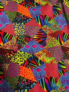 an image of a colorful pattern that looks like it has been made out of fabric