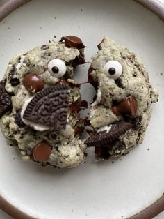 an oreo cookie with chocolate chips and googly eyes