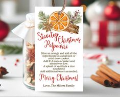 a christmas card with an orange slice and cinnamon