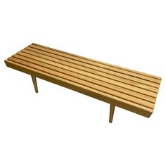 a wooden bench sitting on top of a white background