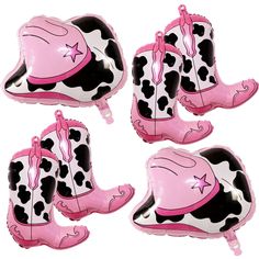 four pink and black cowboy boots shaped balloons