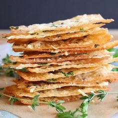 a stack of food sitting on top of a wooden table