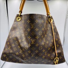 100% Authentic Louis Vuitton Artsy Mm Monogram Very Good Condition Base Length: 18.5 Inheight: 14 Inwidth: 7inch Drop: 5 In Same Condition Shown In The Picture No Piping No Cracks Inside Clean . Includes Dust Bag . Louis Vuitton Noe Bag, Louis Vuitton Tivoli, Louis Vuitton Artsy Mm, Mm Monogram, Louis Vuitton Artsy, Bags Louis Vuitton, Louis Vuitton Neverfull Mm, Canvas Handbags, Louis Vuitton Bags