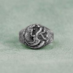 Targaryen Silver Men Ring, Targaryen Dragon and Stark Targaryen Wolf Got Ring, Good Mythology Jewelry, Anniversary Gift, Gift For Boyfriend   Made of 925 silver and handcrafted by hand, this ring is not only an accessory piece that complements your daily elegance, but also has details that will reflect your character and style. It is also a great gift to give to your loved ones on their special days. At SavisSilver, we always give importance to the satisfaction of our customers, we recommend you Game Of Thrones Rings, Targaryen Ring, Targaryen Jewelry, Stark Targaryen, Game Of Thrones Jewelry, Mythology Jewelry, Silver Men Ring, Mens Rings Fashion, Dragon Ring