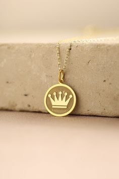 Gold Crown Pendant - Crown Gold Necklace ● Material of pendant: Solid Gold 14k ( REAL GOLD ) ● Metal Stamp: 14k ( REAL GOLD ) ● The pendant is available in 5 sizes: - 12,7 mm / 0.5 inches (Diameter) - 14,0 mm / 0,55 inches ( Diameter ) In the photos - 15,3 mm / 0.6 inches ( Diameter ) - 16,5 mm / 0,65 inches ( Diameter ) - 19,1 mm / 0,75 inches ( Diameter ) ( In the photos the size is 14mm / 0.55 inches Diameter ) ( Jump Ring inner diameter: 4 mm ) ● Material of chain: Solid gold 14k ( REAL GOLD 14k Gold Necklace For Gift, 14k Gold Necklace As A Gift, 14k Gold Necklace With Round Pendant, Round 14k Gold Necklace For Gift, Elegant Tarnish Resistant Necklace For Birthday, 14k Yellow Gold Necklace For Gift, 14k Yellow Gold Necklace Gift, 14k Yellow Gold Necklace As Gift, Gold Tarnish-resistant Jewelry For Birthday