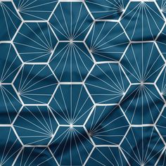 a blue background with white lines and shapes in the shape of hexagons