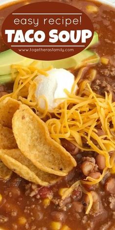 a white bowl filled with taco soup and tortilla chips