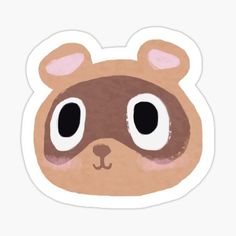 a sticker with an image of a bear's face in the shape of a mask