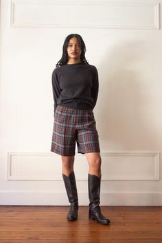 Super cool 1980s plaid wool shorts. Button and zip closure, tab pull details at the waist to tighten as needed. Hip pockets. label: JHC measurements: estimated modern size: Medium (shown on 5'9 model, size 6) marked size: 12 waist: 28.5" hip: 42" rise: 12" materials: 100% wool condition: Excellent ALL SALES FINAL Ladies Wool Plaid Shorts Preppy, Plaid Wool Shorts, High Waist Plaid Cotton Shorts, Plaid Bottoms With Built-in Shorts For Spring, Plaid Bottoms With Built-in Shorts, Fall Shorts, Skorts, Super Cool, Wool Plaid