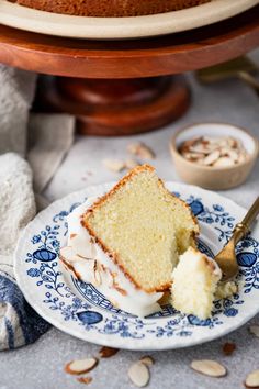 a slice of cake on a blue and white plate