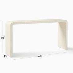 a white table with measurements for the top and bottom section, including an angled edge