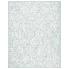 a blue and white rug with an intricate design