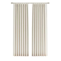 two white curtains hanging on a metal rod