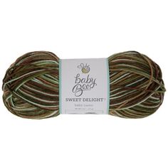 a ball of yarn with brown and green stripes