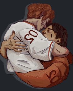 two baseball players hugging each other while one is holding the other in his arms,