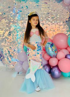 Transform your little girl's dreams into reality with our enchanting mermaid dress, designed for girls aged 1-10. The dress is an enchanting mermaid-themed dress designed for girls. It features a fitted bodice adorned with shimmering sequins that reflect light beautifully. The bodice also includes a delicate pink seashell design at the chest area, adding to the mermaid aesthetic. The lower part of the dress transitions into a tulle skirt with a light blue hue, mimicking the tail of a mermaid. Th Mermaid Dress Kids, Mermaid Dress For Kids, Mermaid Birthday Outfit, Dress With Tulle Skirt, Dress Designs For Girls, Pink Seashell, Seashell Design, Dress With Tulle, Mermaid Aesthetic