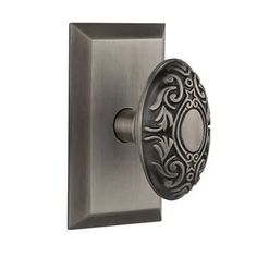 an ornate door knob with a decorative design on it