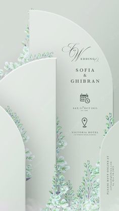 the wedding card is designed to look like it has flowers and leaves on it,